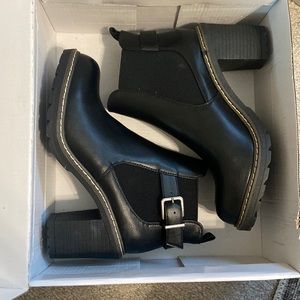 New in box size 8 black booties. Olivia Miller brand
